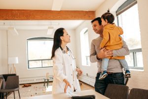 Doctor visit a little patient at home